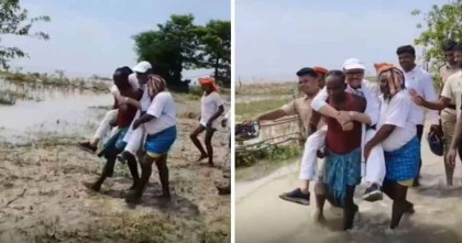 বন্যা পরিদর্শনে গিয়ে গ্রামবাসীর কাঁধে ভারতীয় এমপি